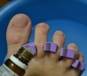 Prepare to treat your nails with antifungal drops